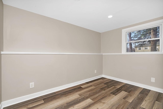 empty room featuring wood-type flooring