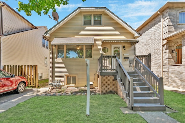 view of front facade featuring a front yard