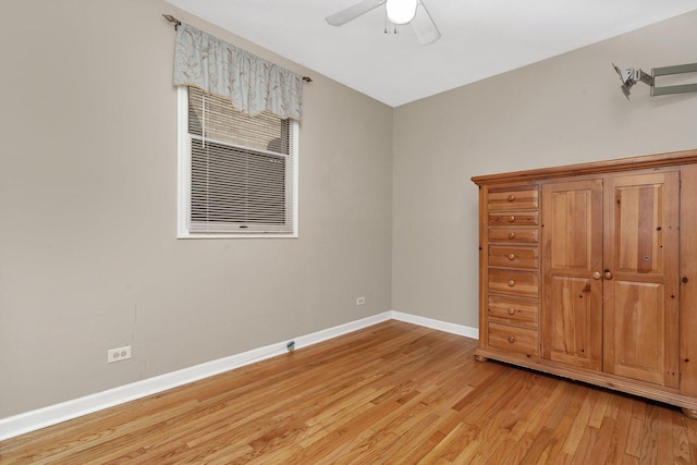 unfurnished bedroom with light hardwood / wood-style floors and ceiling fan