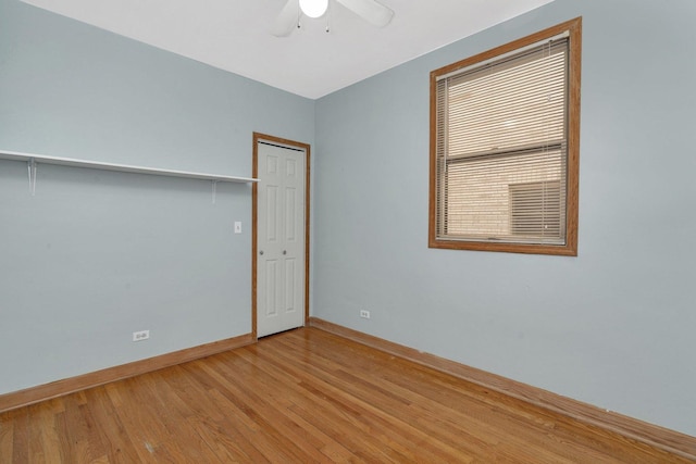 spare room with ceiling fan and light hardwood / wood-style flooring