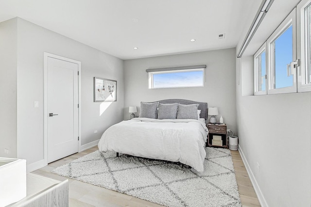 bedroom featuring light hardwood / wood-style floors