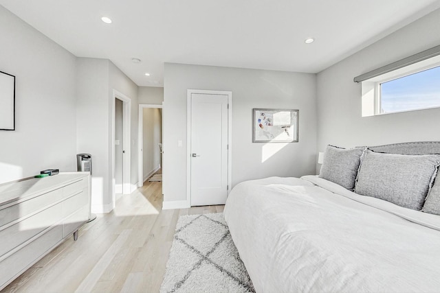 bedroom featuring light hardwood / wood-style flooring