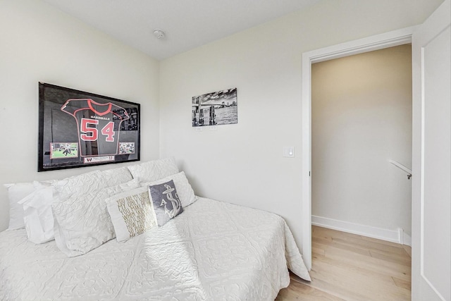 bedroom featuring hardwood / wood-style floors