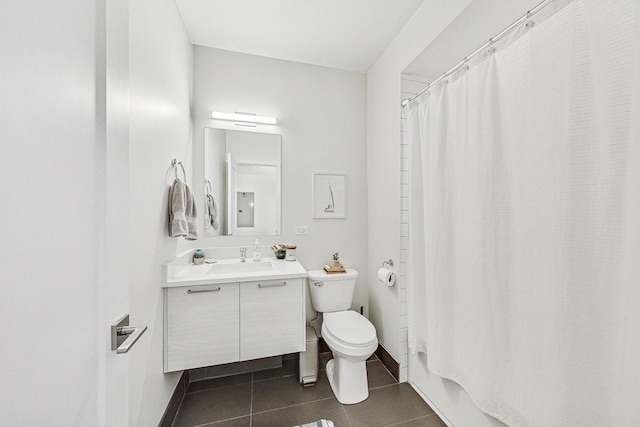 full bathroom featuring tile patterned flooring, shower / bath combo, vanity, and toilet