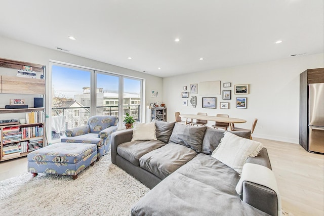 living room featuring light wood-type flooring