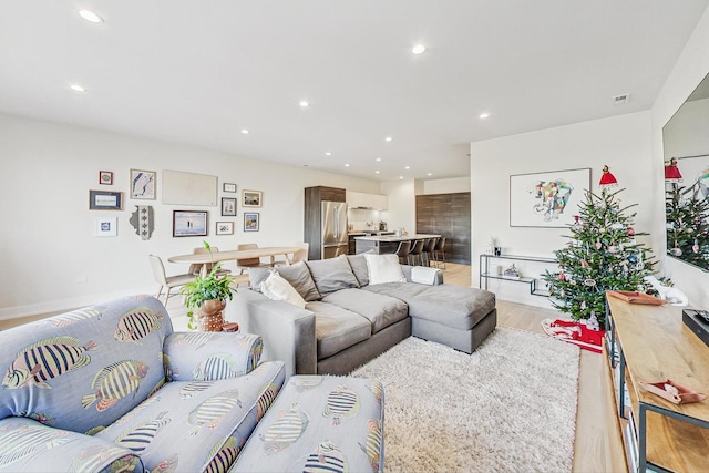 living room with light hardwood / wood-style floors