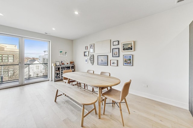 dining area featuring light hardwood / wood-style floors