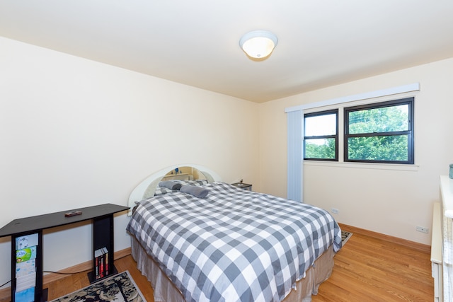 bedroom featuring light wood-type flooring