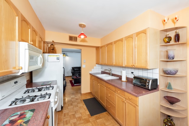 kitchen with light brown cabinetry, tasteful backsplash, white appliances, light parquet floors, and sink