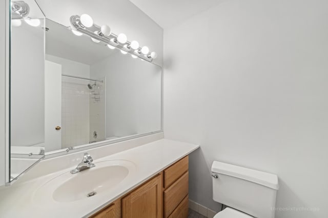 full bathroom featuring vanity, toilet, and shower / washtub combination