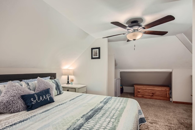 carpeted bedroom with ceiling fan and lofted ceiling