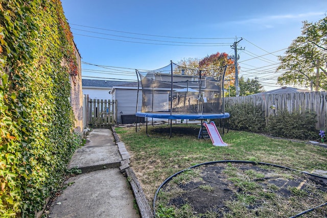 view of yard featuring a trampoline