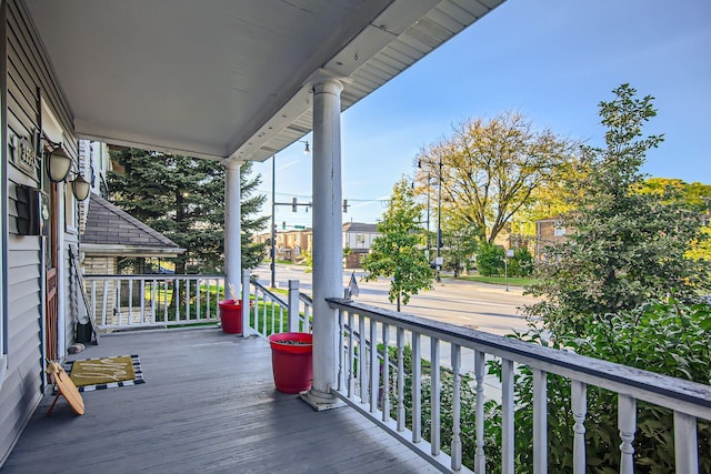 wooden terrace featuring a porch