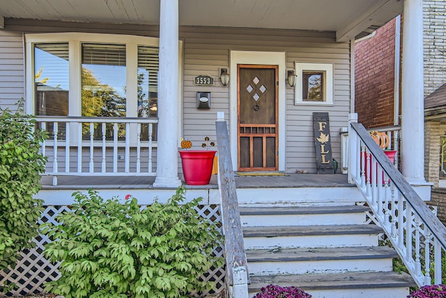 property entrance featuring covered porch