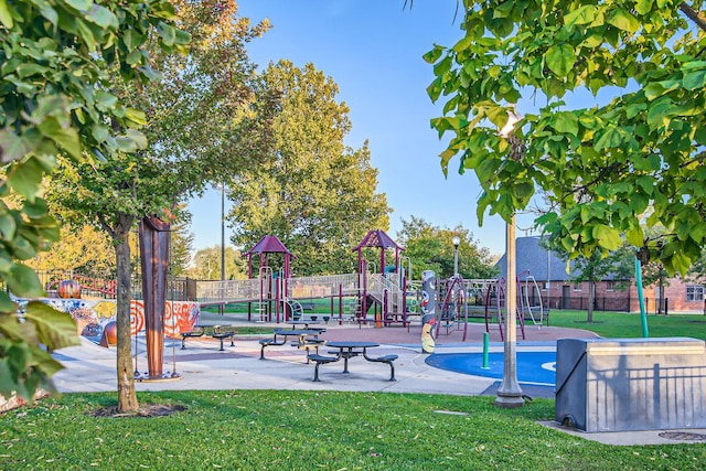 view of community featuring a yard and a playground