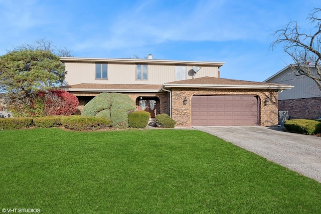 view of front of house featuring a front yard and a garage