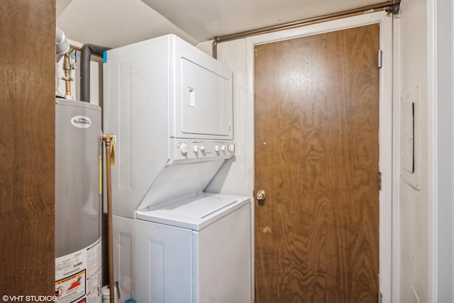 washroom featuring gas water heater and stacked washer and clothes dryer