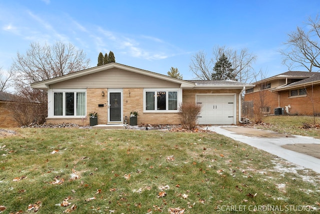 single story home featuring a front lawn, cooling unit, and a garage