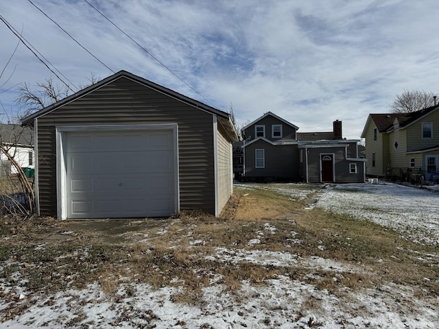 view of snow covered garage