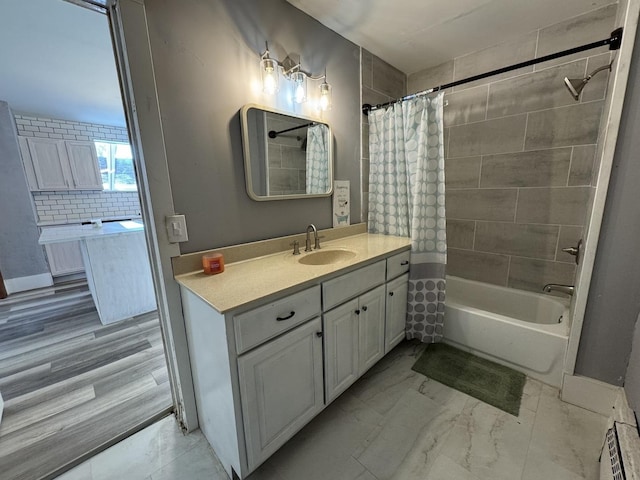 bathroom with vanity and shower / bathtub combination with curtain