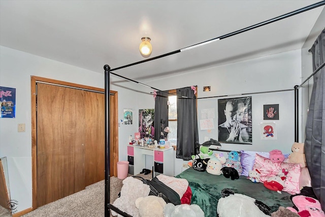 carpeted bedroom featuring a closet