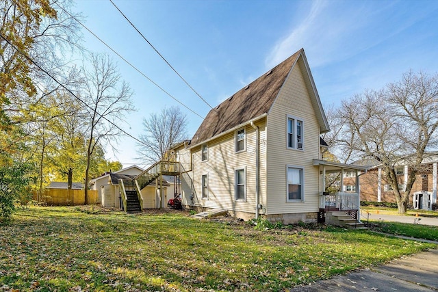 view of property exterior featuring a yard