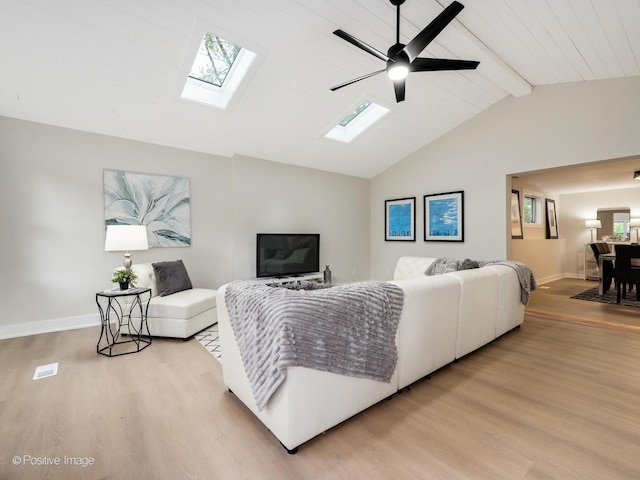 living room featuring ceiling fan, wooden ceiling, lofted ceiling with beams, and light wood-type flooring