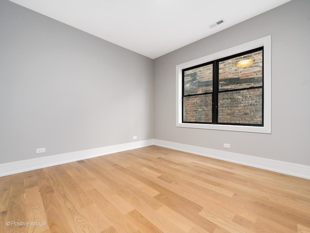 empty room featuring light hardwood / wood-style floors