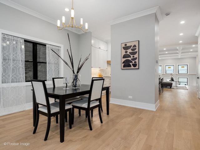 dining space featuring beam ceiling, light hardwood / wood-style floors, crown molding, and coffered ceiling