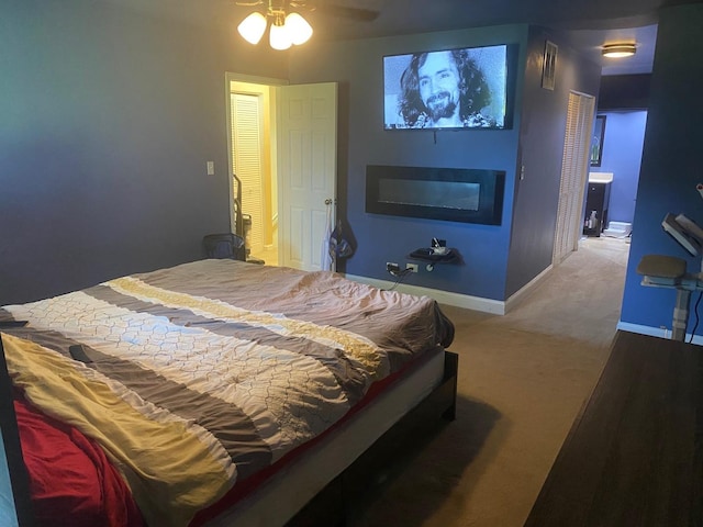 bedroom featuring carpet flooring and ceiling fan