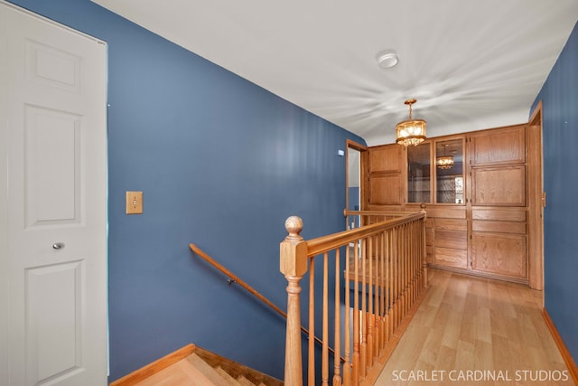 stairway featuring hardwood / wood-style flooring