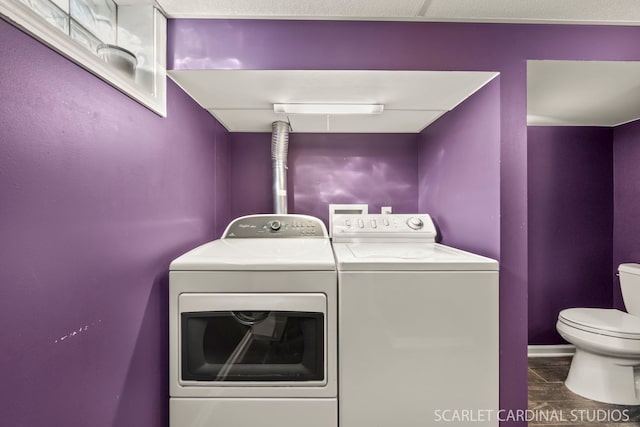 laundry area with washing machine and dryer