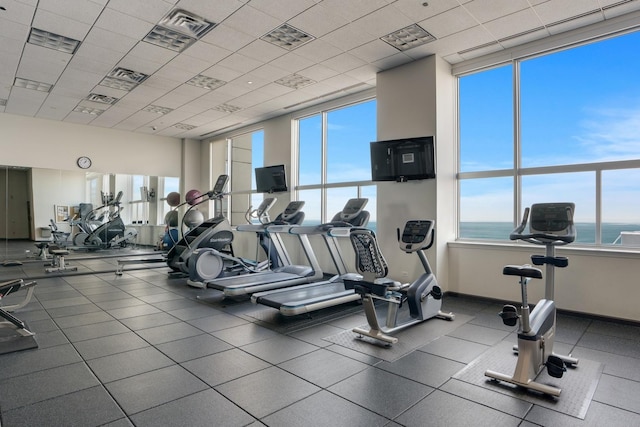 gym featuring a drop ceiling