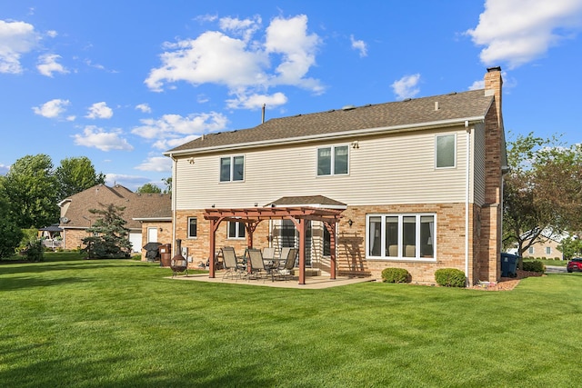 back of house with a patio, brick siding, a lawn, a pergola, and a chimney