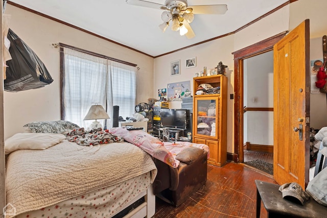 bedroom with ceiling fan and crown molding