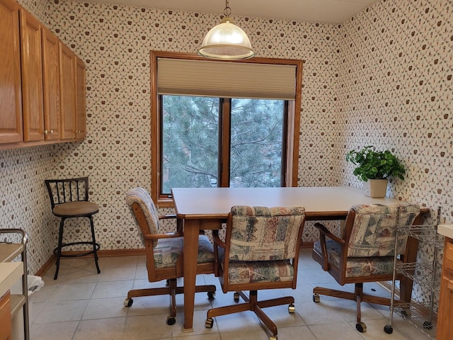 dining area featuring light tile patterned floors