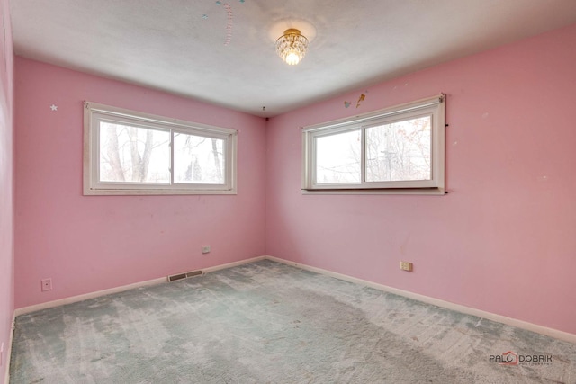 view of carpeted spare room