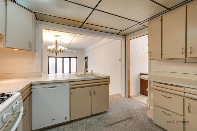 kitchen with decorative backsplash, a paneled ceiling, white appliances, light colored carpet, and sink