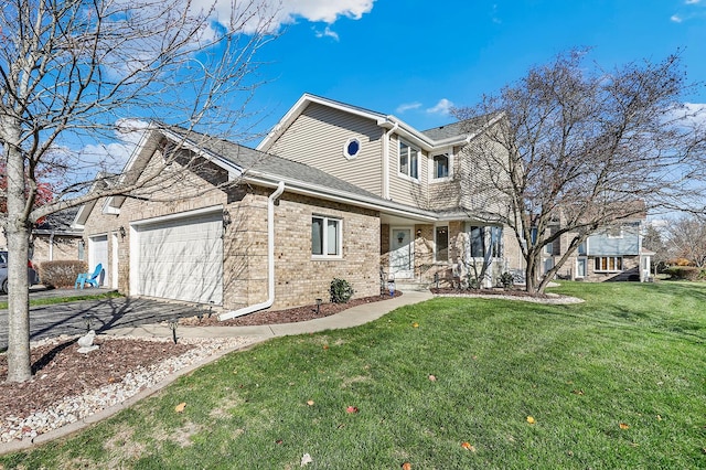 view of front facade with a garage and a front lawn