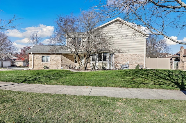 view of front of house with a front lawn