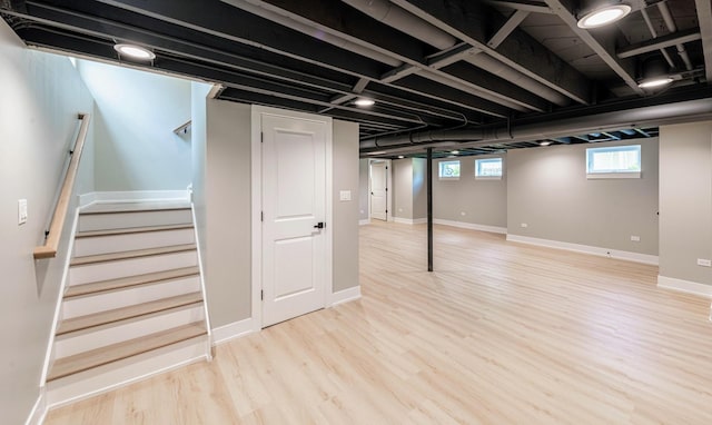 basement with light wood-type flooring