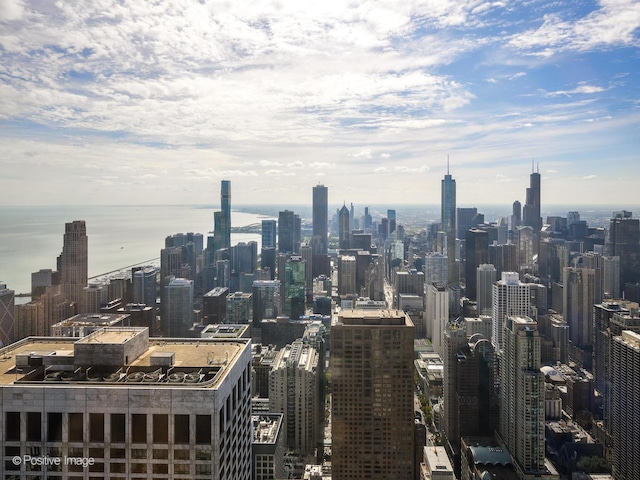 property's view of city featuring a water view