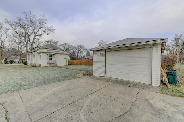 garage featuring a yard