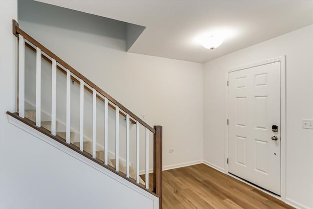 foyer entrance with light hardwood / wood-style flooring