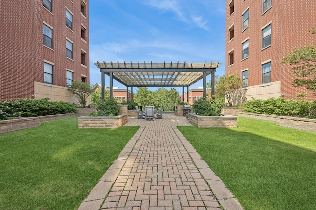 exterior space with a pergola, a yard, and a patio