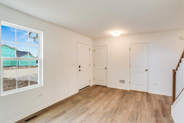 entryway featuring hardwood / wood-style flooring