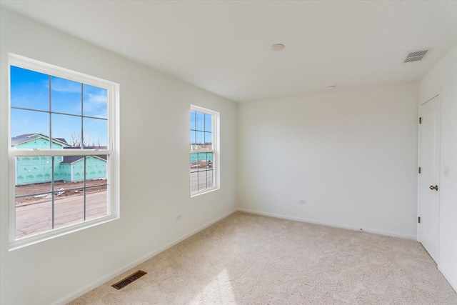 view of carpeted spare room