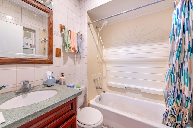 full bathroom with vanity, toilet, tasteful backsplash, tile walls, and shower / tub combo with curtain