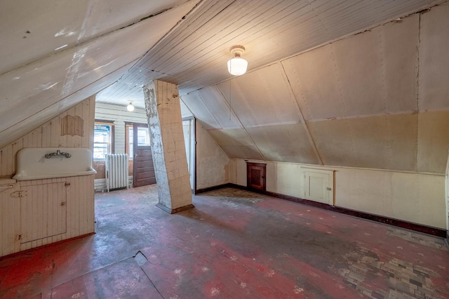 additional living space with vaulted ceiling