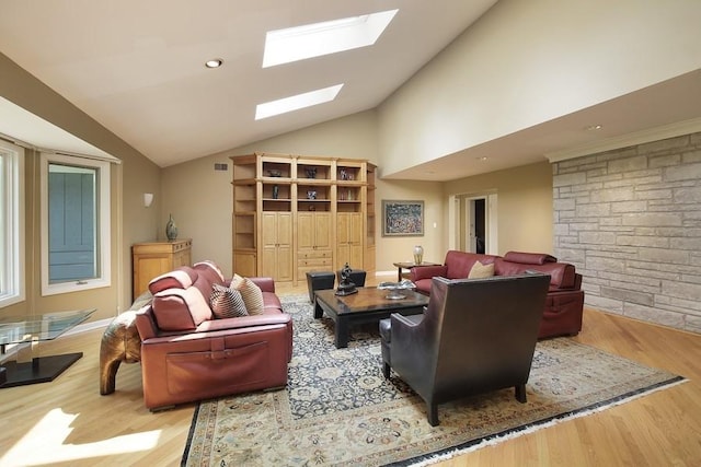 living room featuring light hardwood / wood-style flooring and lofted ceiling